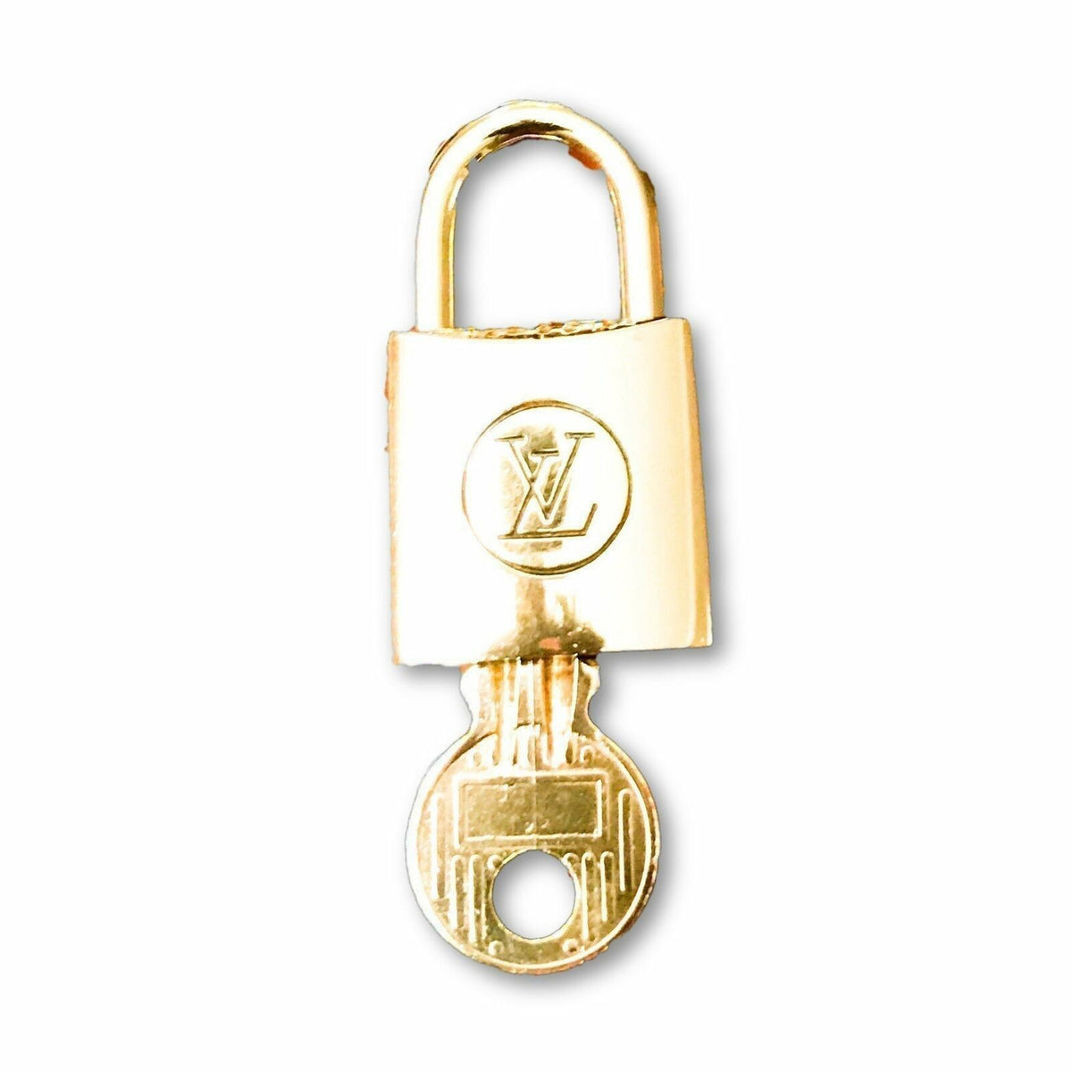 Louis Vuitton Silver Padlock and Key Set Lock Cadena 12LV1104 For Sale at  1stDibs