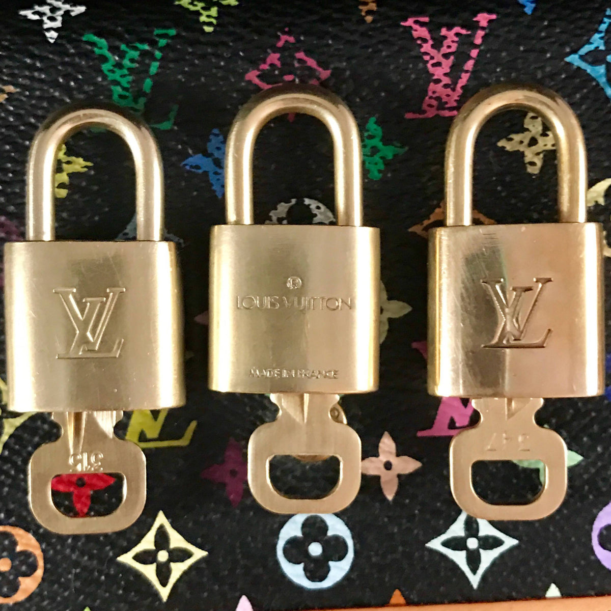 Louis Vuitton Lock & Key set in shining excellent condition, #323
