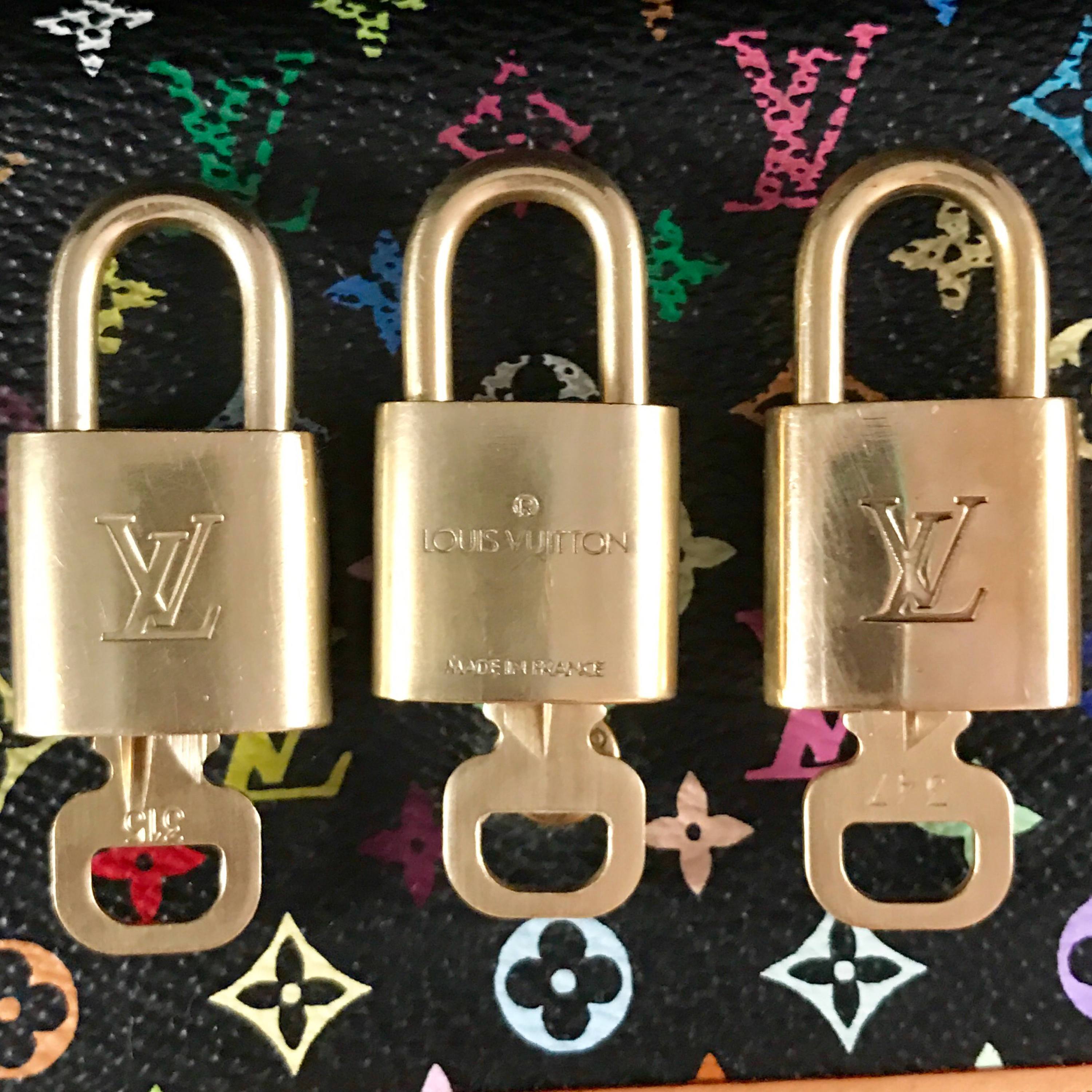 Authentic Louis Vuitton lock and key set #448 Gold