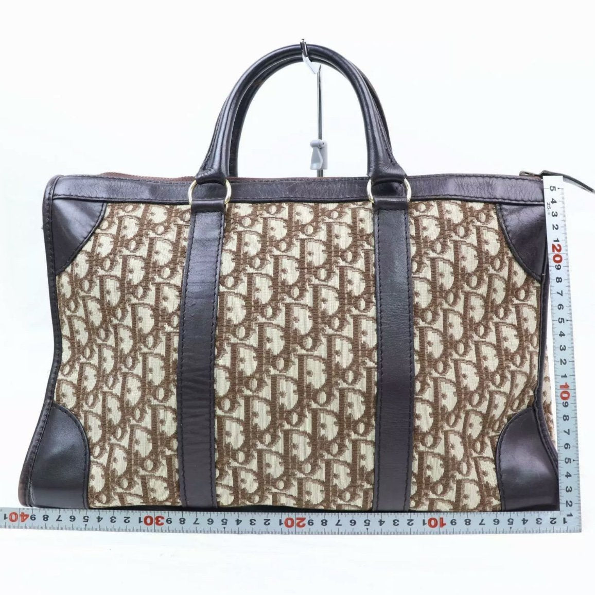 A Christian Dior Brown Monogram Canvas Garment Bag, – The Corner Bazaar