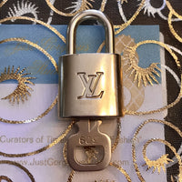 Sold at Auction: (2 Pc) Louis Vuitton Lock and Key with Tag
