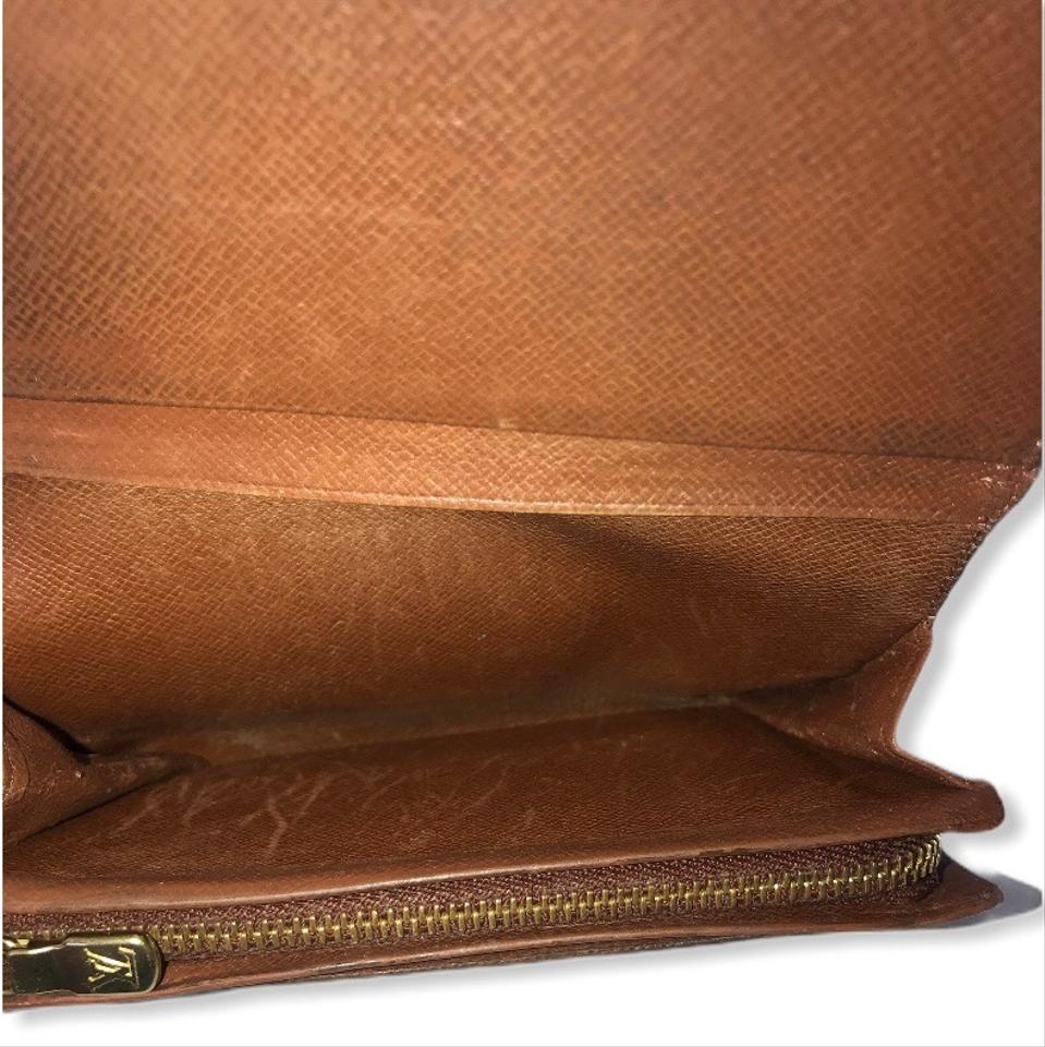 Louis Vuitton, Bags, Louis Vuitton Brown Monogram Canvas And Leather Zippy  Compact Clutch Wallet